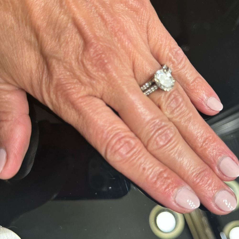 3 Carat engagement ring with band.